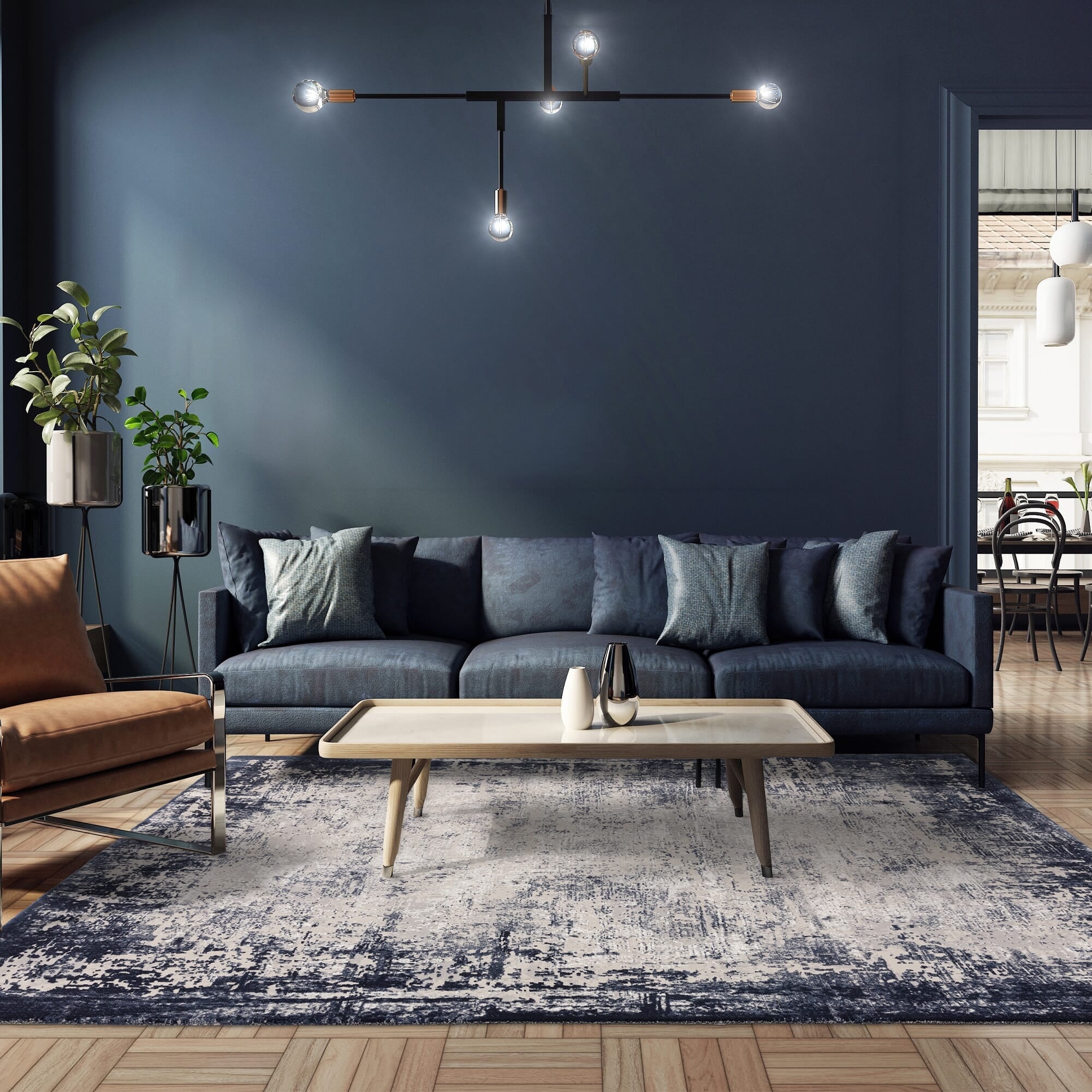 Jewel-tone navy rug styled in modern interior

