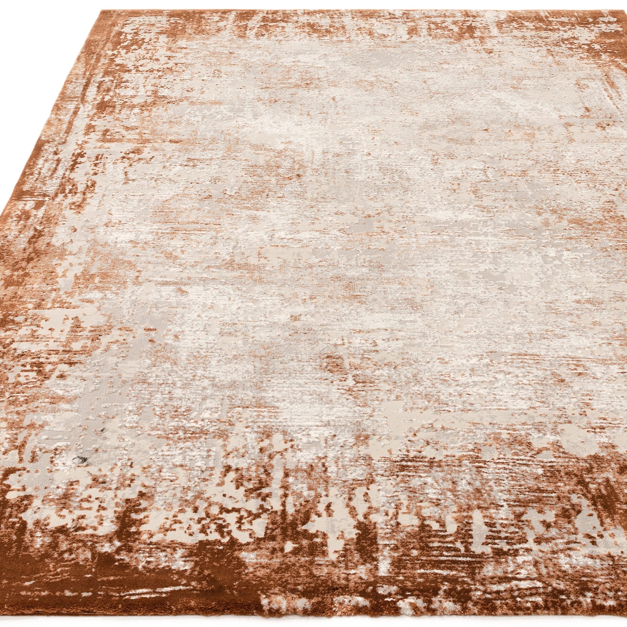 Machine woven rug in earthy orange tone

