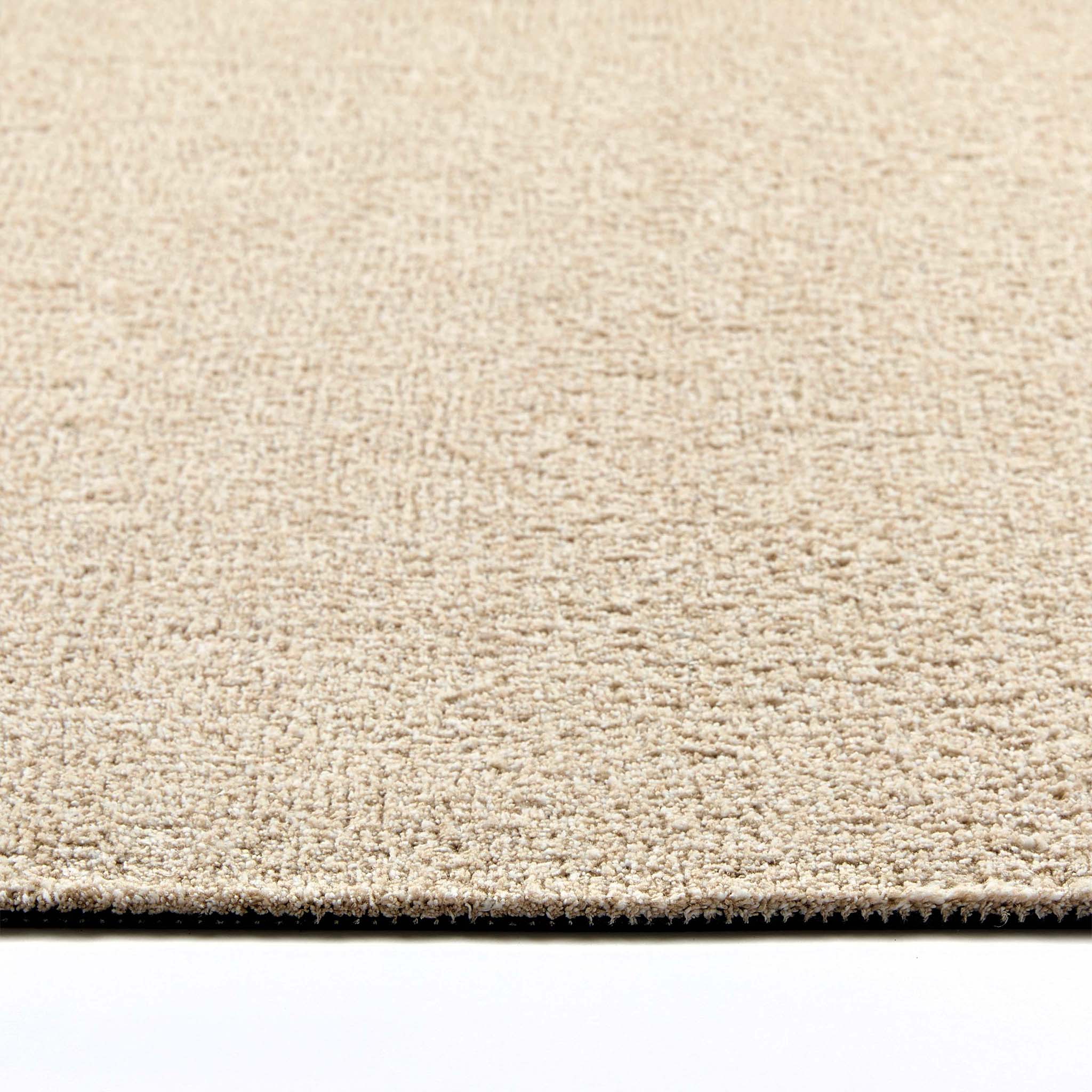 Close-up of Hug Rug beige fleck texture

