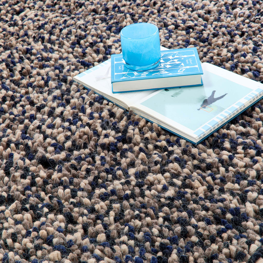 Hand woven navy shaggy wool rug