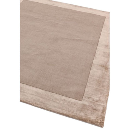 Hand woven wool rug in sand colour

