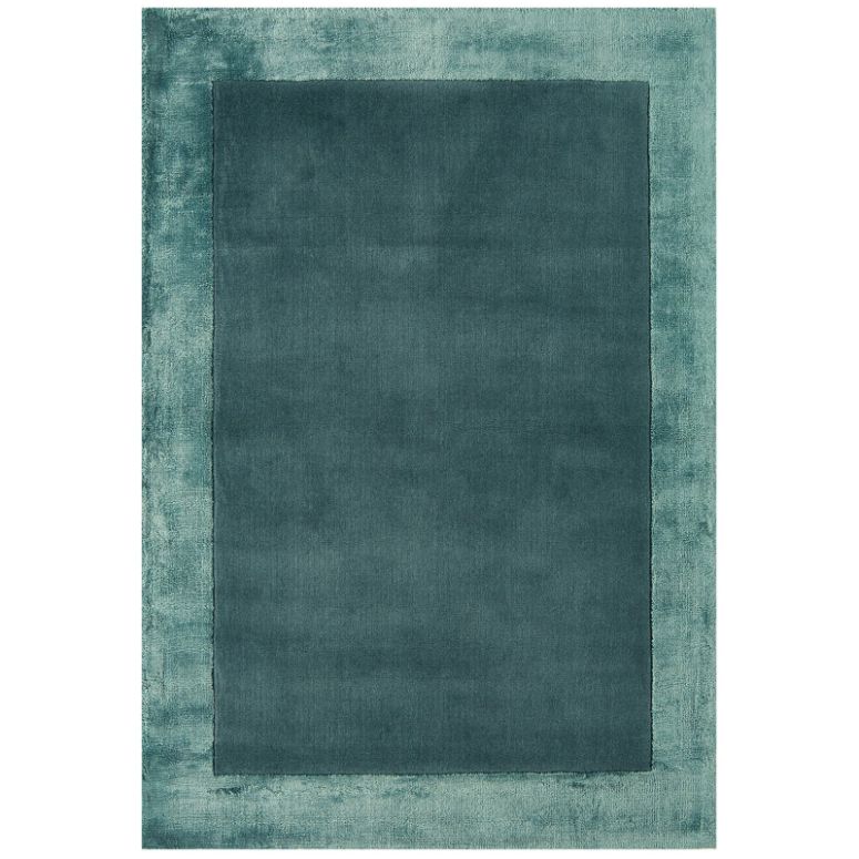 Aqua blue border rug hand woven in India

