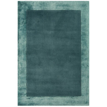 Aqua blue border rug hand woven in India

