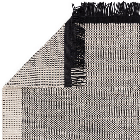 Artisan-crafted black and white rug

