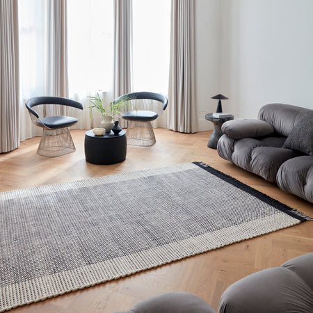Modern monochrome rug in living space

