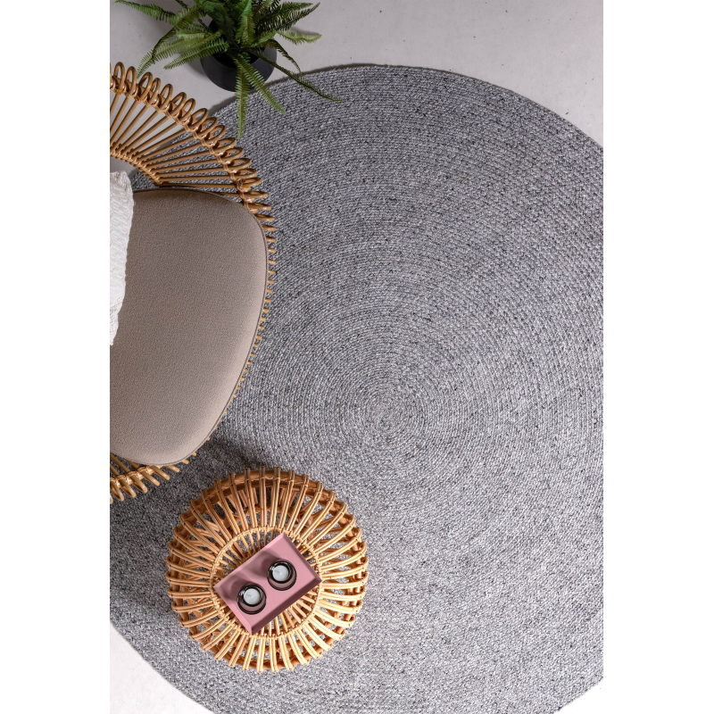 Hand braided sustainable round rug

