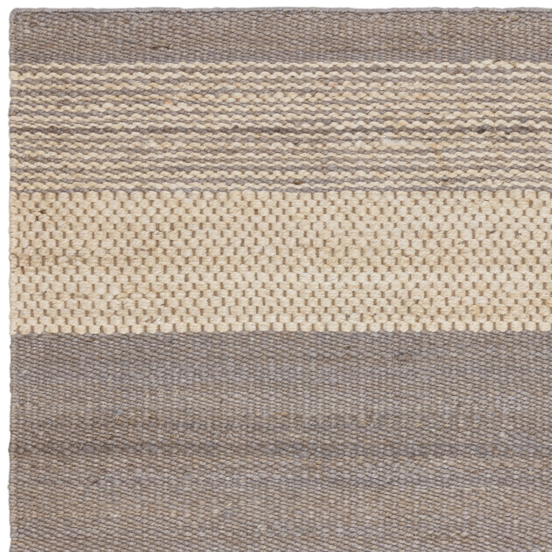 Hand woven jute rug with low profile

