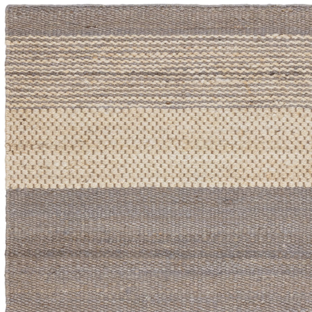 Hand woven jute rug with low profile

