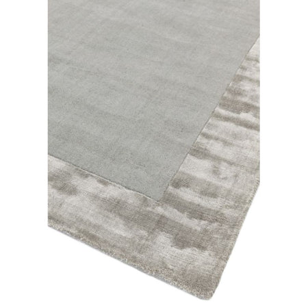 Close-up of soft grey wool and viscose rug

