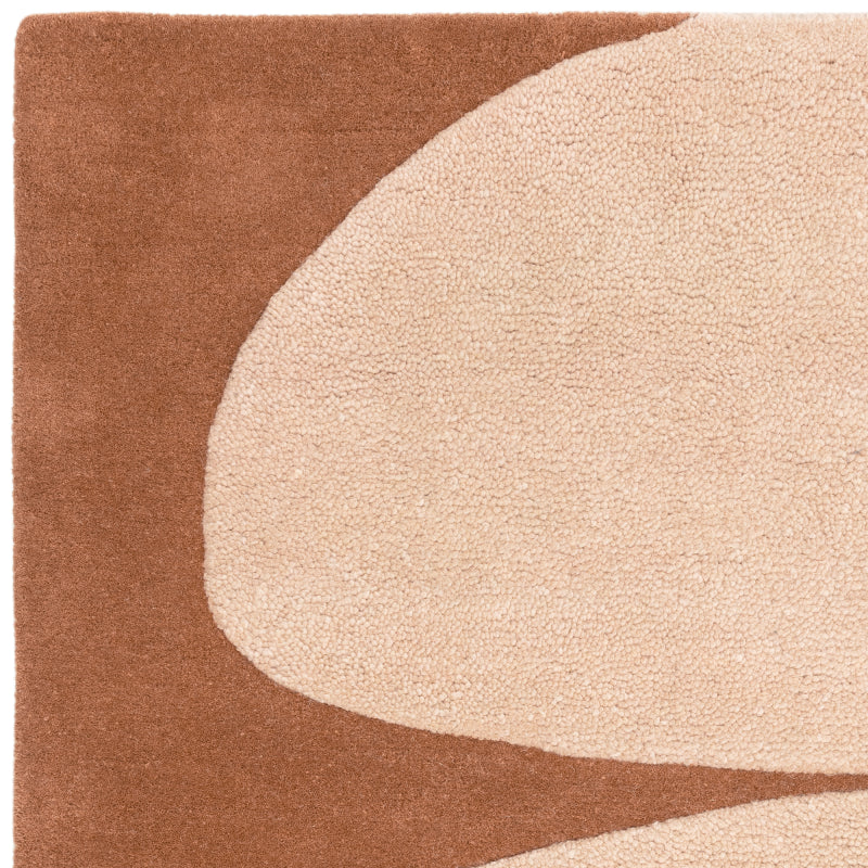 Modern wool rug with layered colour blocks


