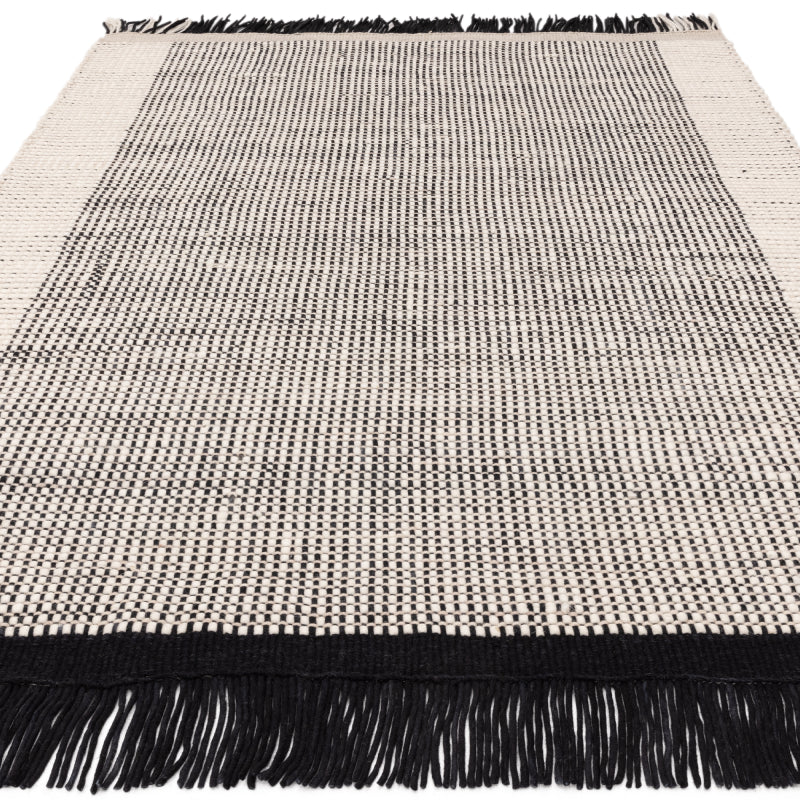 Black and white handwoven wool rug

