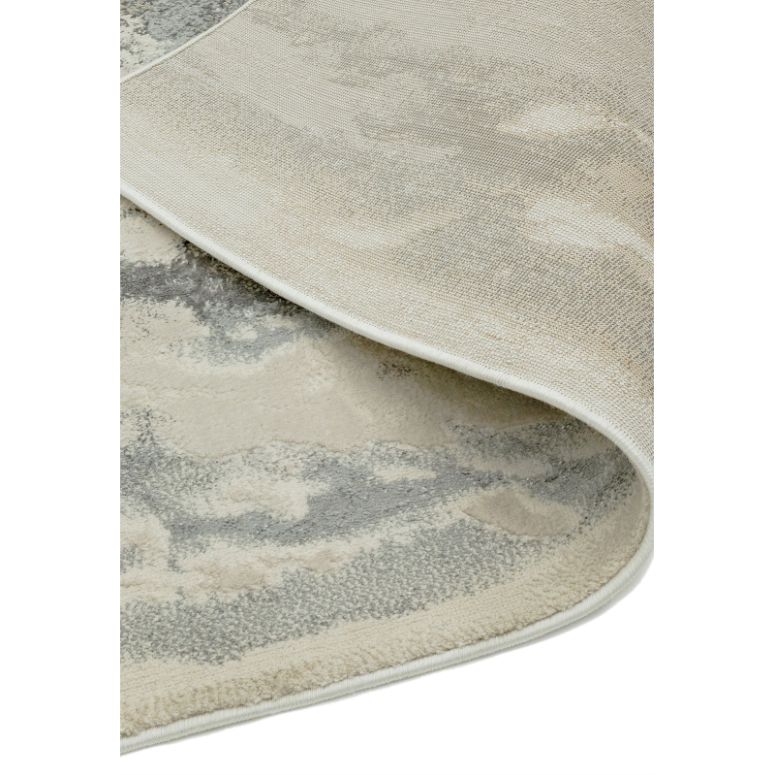 Machine woven rug with metallic accents

