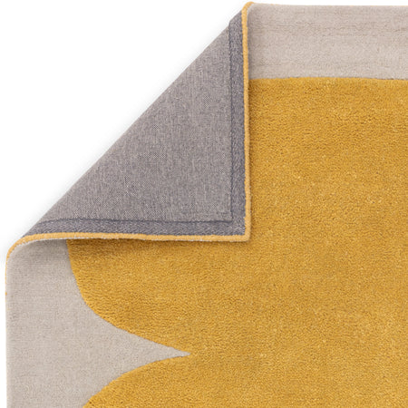Artisan-made rug with architectural texture

