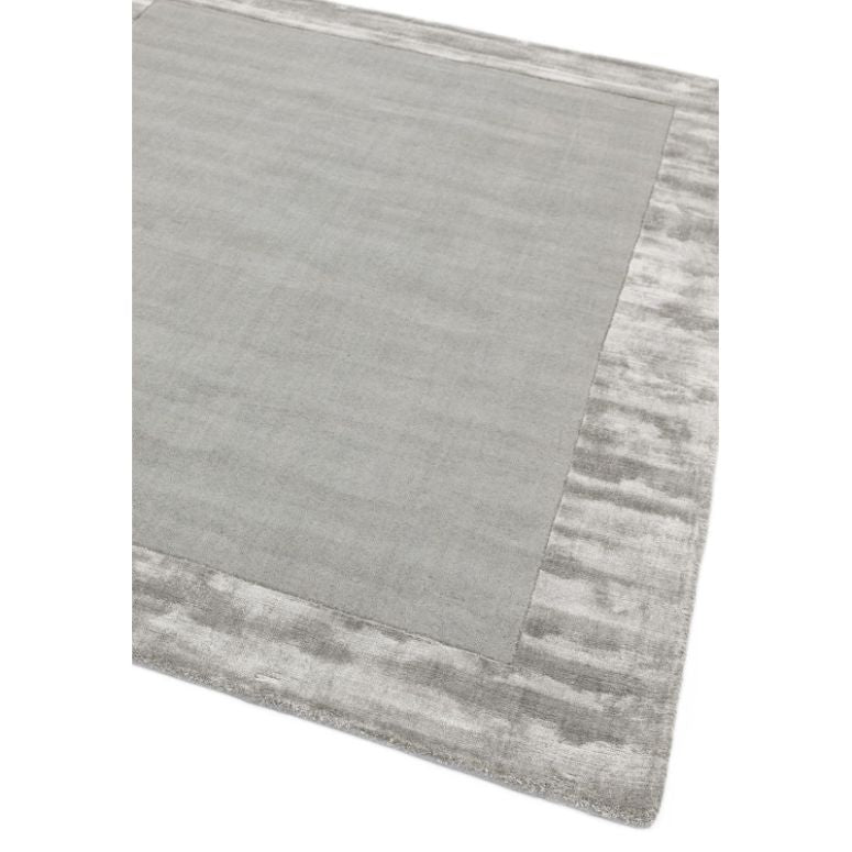 Hand woven silver border rug

