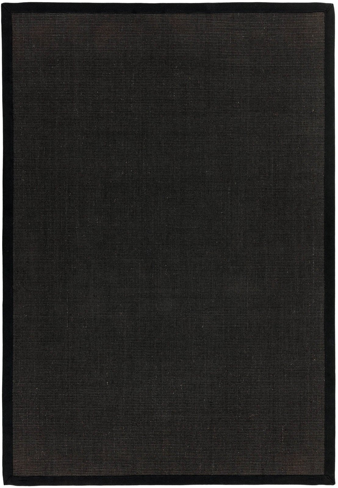 Flatweave sisal rug with black edge in hallway