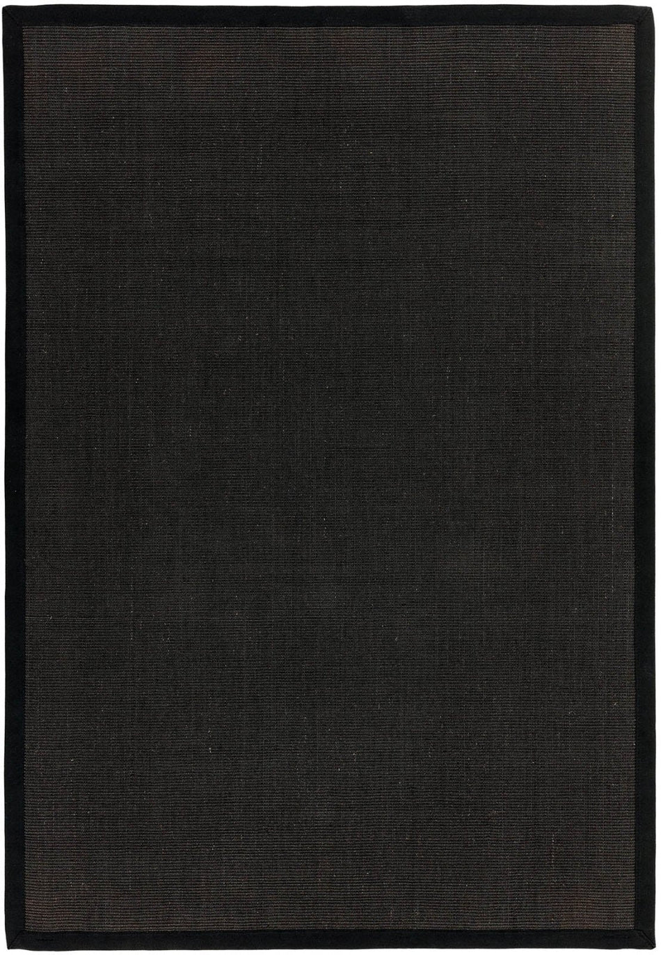 Flatweave sisal rug with black edge in hallway