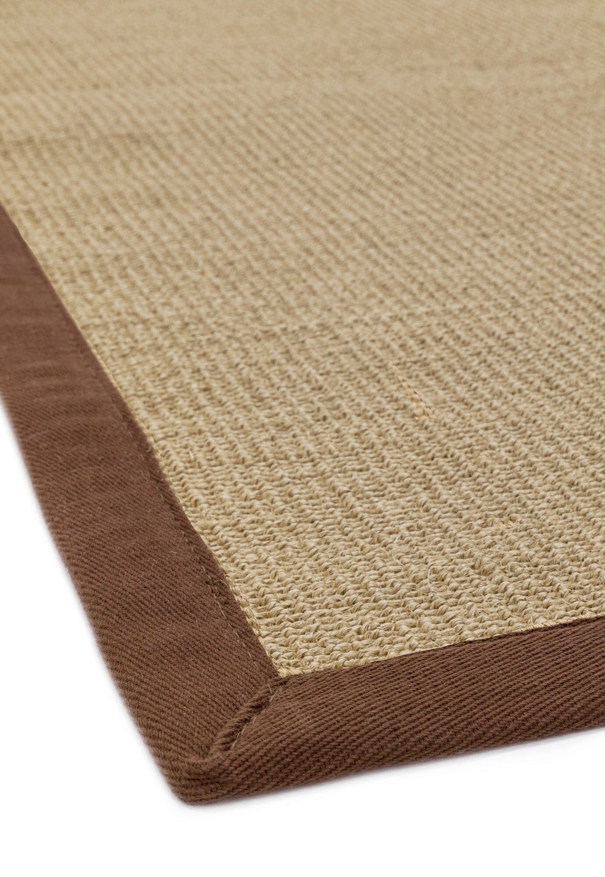 Hand-finished brown border on sisal rug

