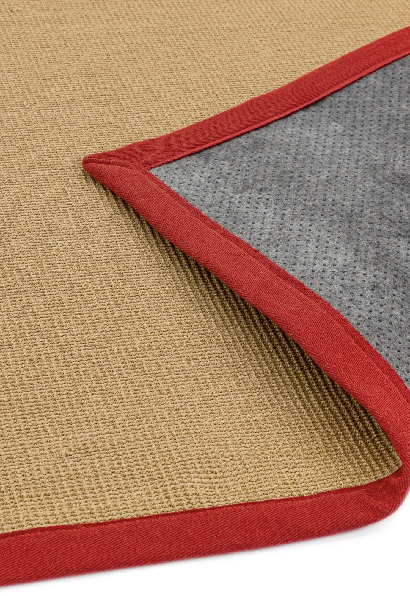 Close-up of sisal texture with vibrant cotton edging and showing non slip backing