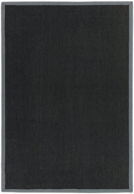 Flatwoven black rug with grey hand-stitched edge