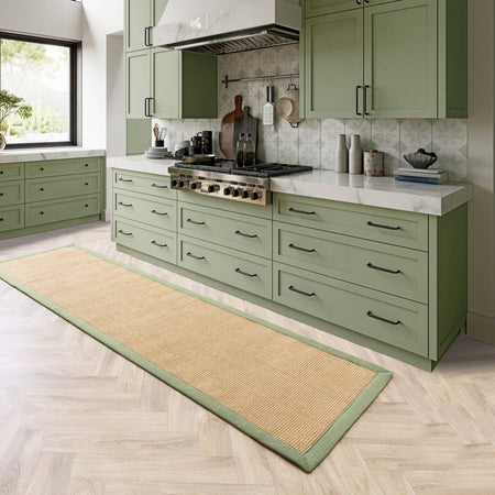 Asiatic sisal rug in kitchen with green detail