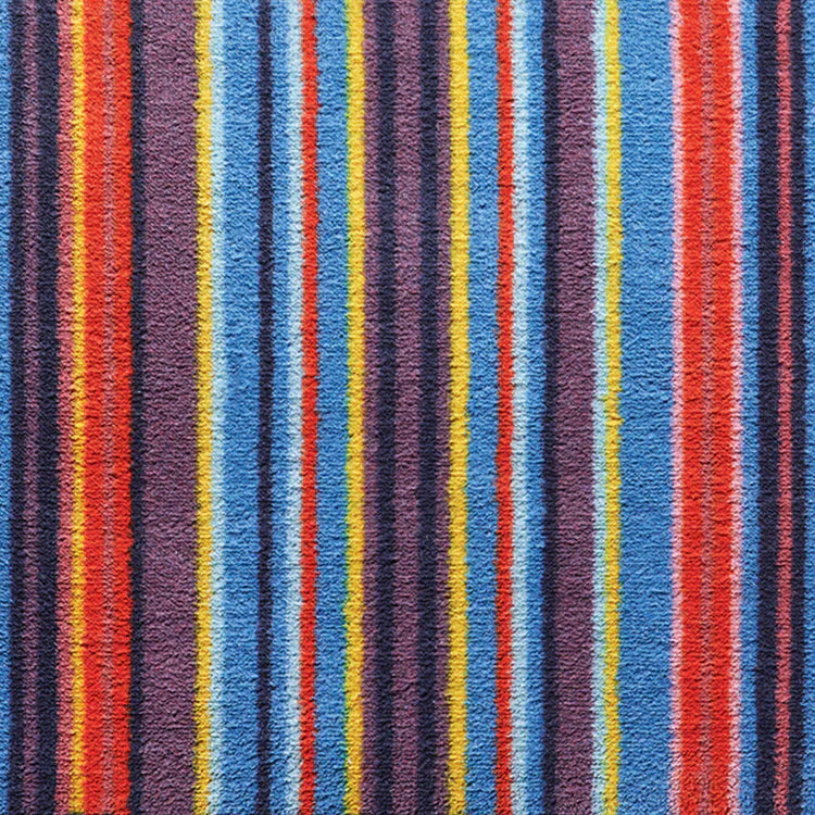 Close-up of Hug Rug texture and vivid stripe detail

