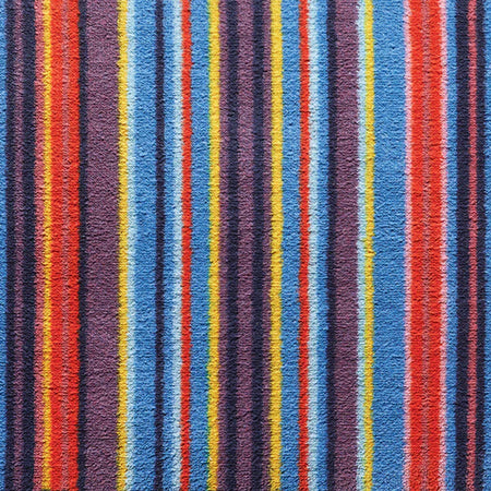 Close-up of Hug Rug texture and vivid stripe detail

